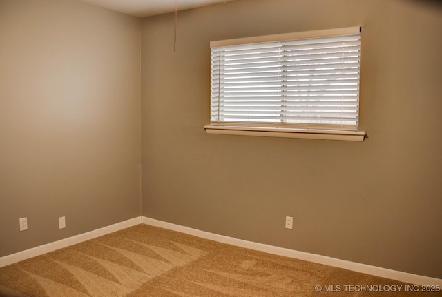 view of carpeted spare room