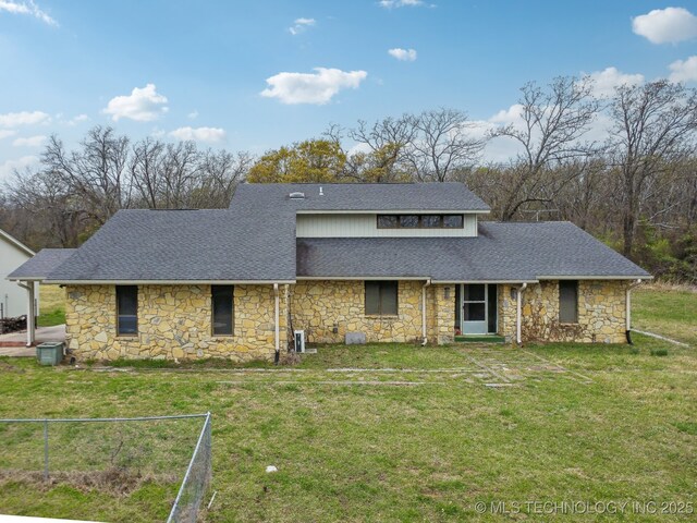 view of front of home with a front yard