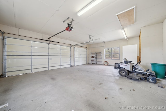 garage featuring a garage door opener