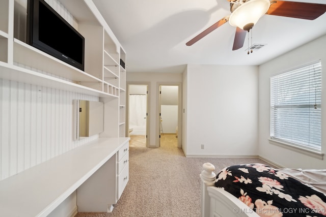 bedroom featuring light carpet and ceiling fan