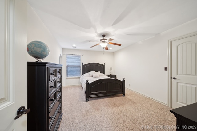 bedroom with ceiling fan and carpet floors