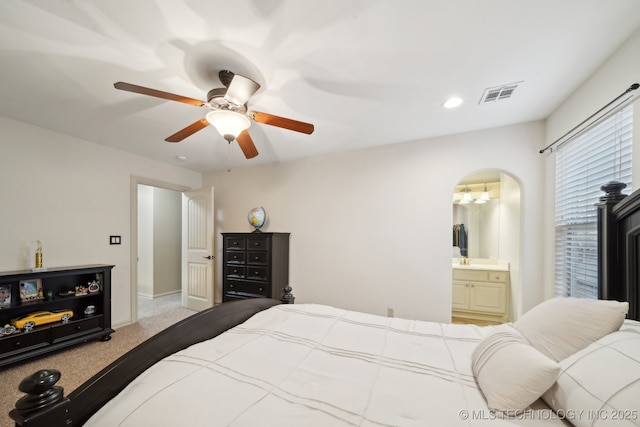 bedroom with light colored carpet and ceiling fan