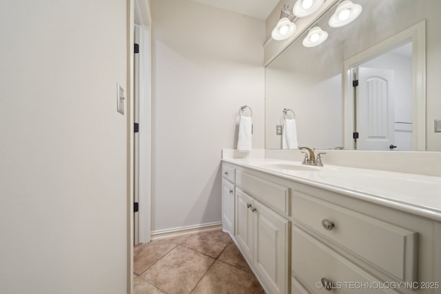 bathroom with vanity and tile patterned floors