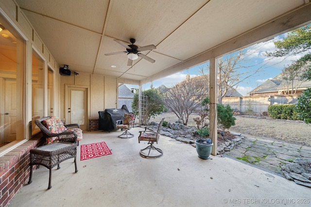 view of patio with grilling area and ceiling fan