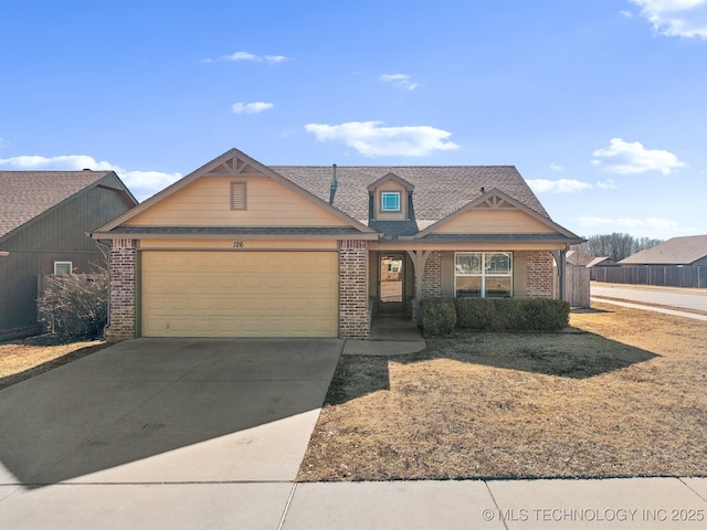 view of front of property featuring a garage