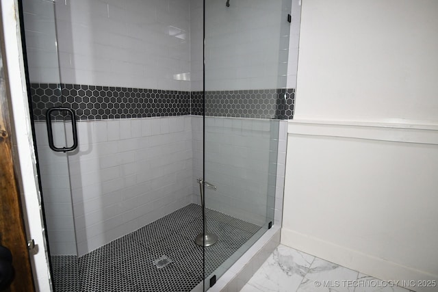 bathroom with an enclosed shower