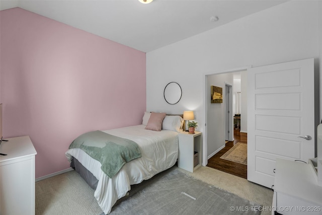 bedroom featuring vaulted ceiling