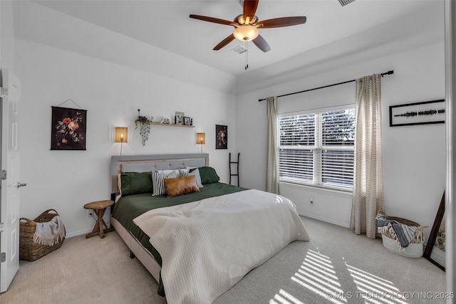 bedroom with light colored carpet and ceiling fan