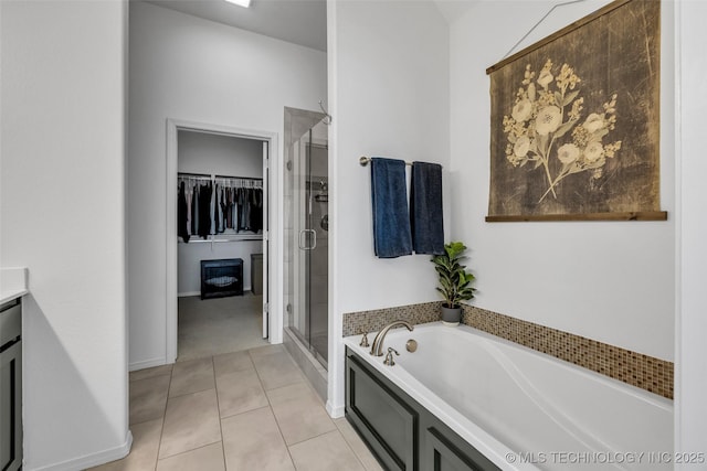 bathroom with vanity, separate shower and tub, and tile patterned floors