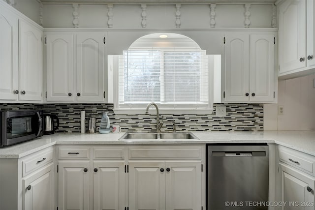 kitchen featuring white cabinetry, sink, backsplash, and dishwasher