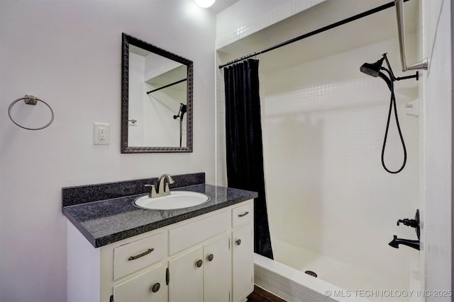 bathroom with vanity and walk in shower