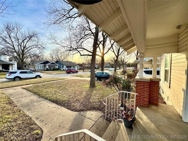 view of yard featuring a residential view