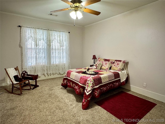 carpeted bedroom featuring visible vents, ceiling fan, baseboards, and ornamental molding