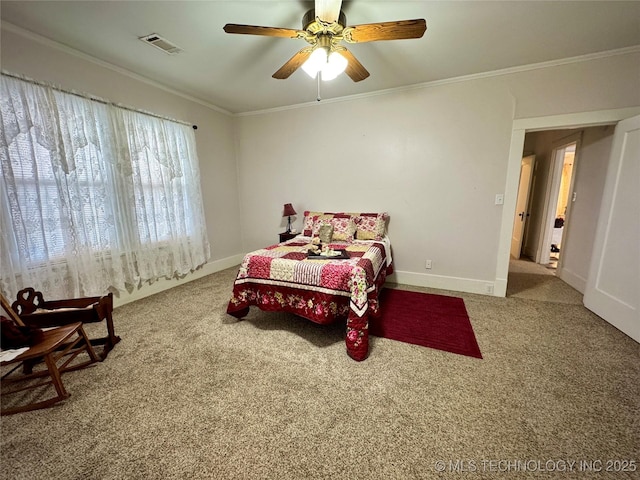 carpeted bedroom with ornamental molding and ceiling fan