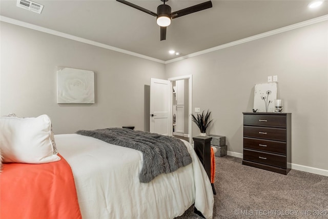 carpeted bedroom featuring crown molding and ceiling fan