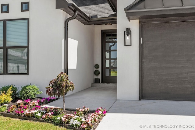 property entrance with a patio