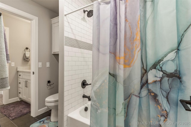 bathroom with shower / tub combo and toilet