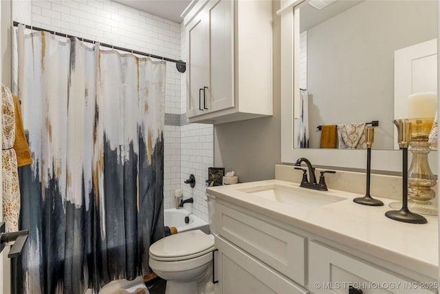 full bathroom with vanity, toilet, and shower / bath combo