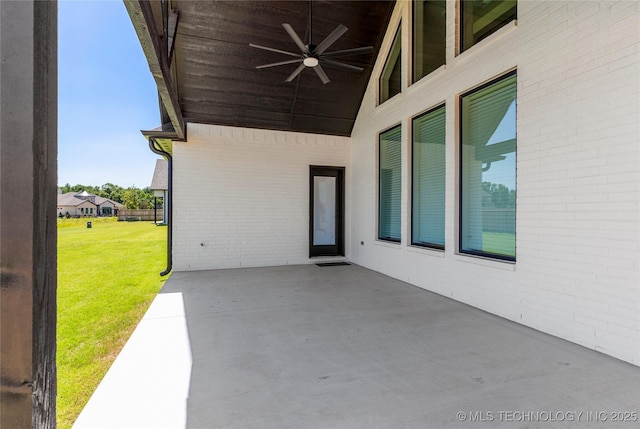 view of patio featuring ceiling fan