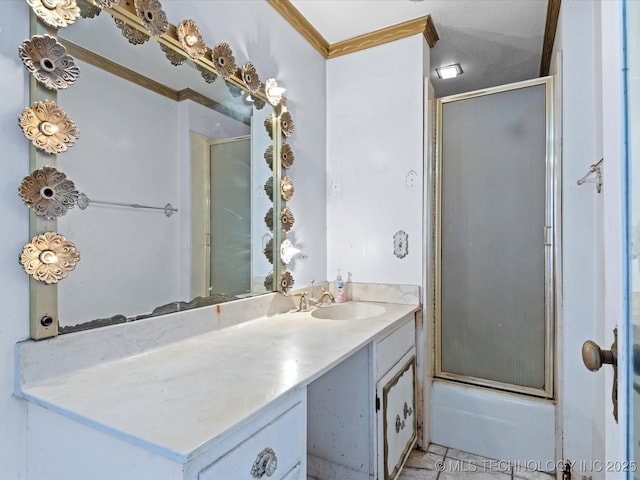 bathroom featuring vanity, crown molding, tile patterned floors, and shower / bath combination with glass door