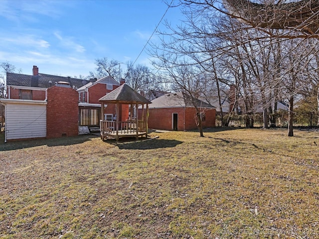 view of yard featuring a wooden deck