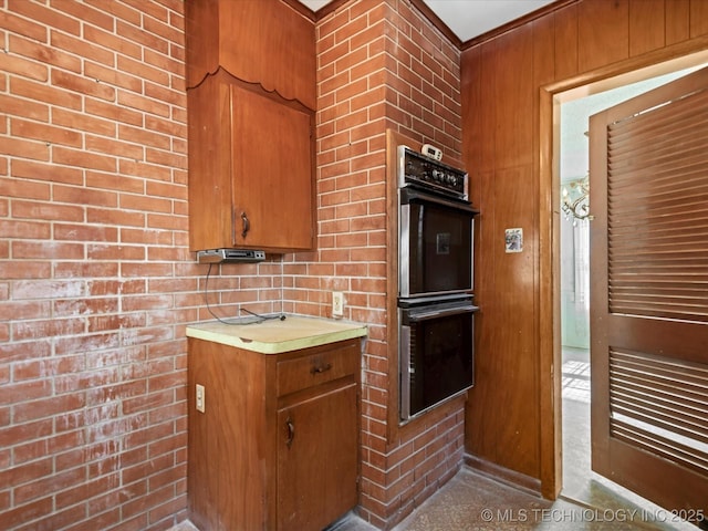 kitchen with stainless steel double oven