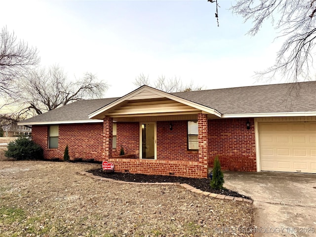 single story home with a garage