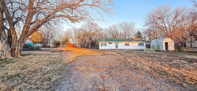 exterior space with a storage unit