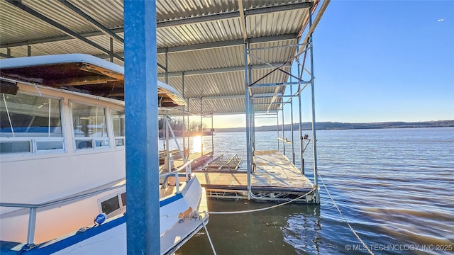 view of dock with a water view