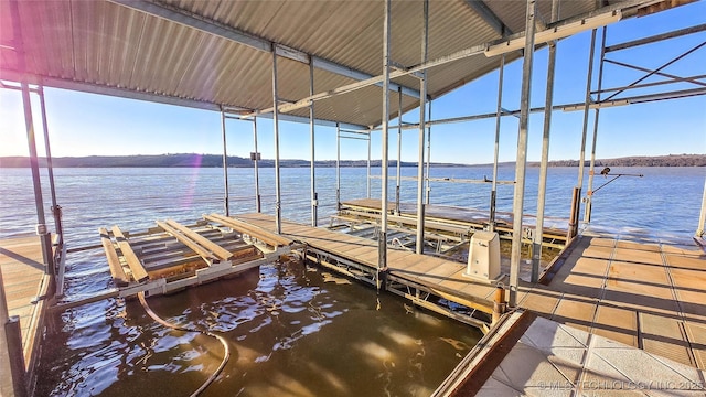 dock area featuring a water view