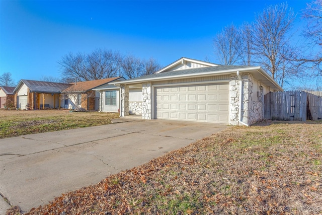 single story home featuring a garage