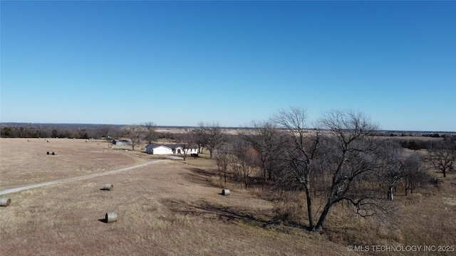 exterior space with a rural view