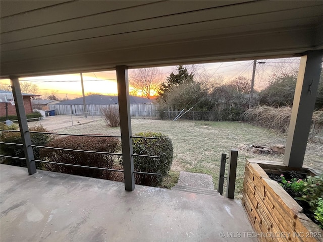 view of patio terrace at dusk