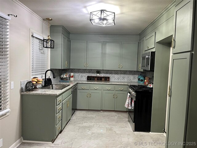 kitchen with tasteful backsplash, green cabinetry, stainless steel appliances, and sink