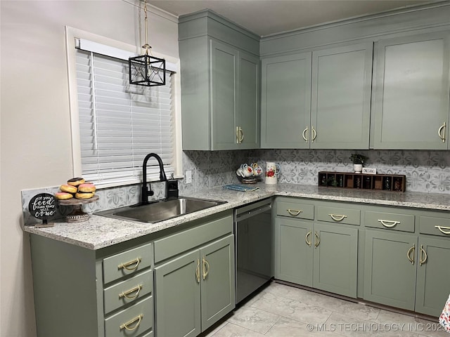 kitchen featuring tasteful backsplash, green cabinets, black dishwasher, and sink