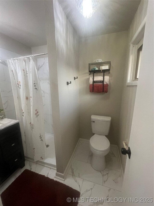 bathroom with vanity, a shower with curtain, and toilet