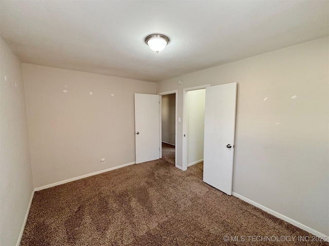 empty room featuring carpet