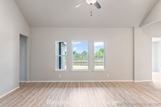 unfurnished room featuring vaulted ceiling, ceiling fan, and light hardwood / wood-style floors