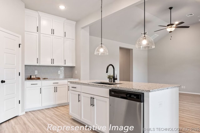 kitchen with a center island with sink, dishwasher, white cabinets, pendant lighting, and backsplash