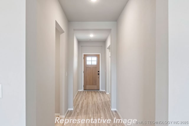 hall featuring light wood-type flooring