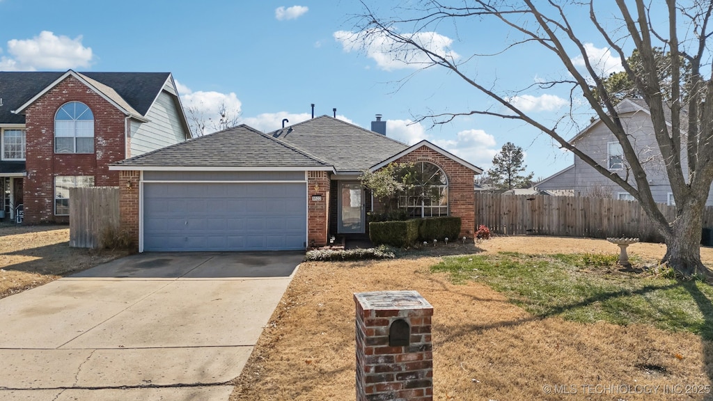 front of property featuring a garage