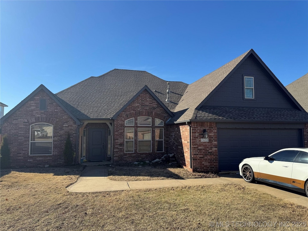 view of front of home with a front yard