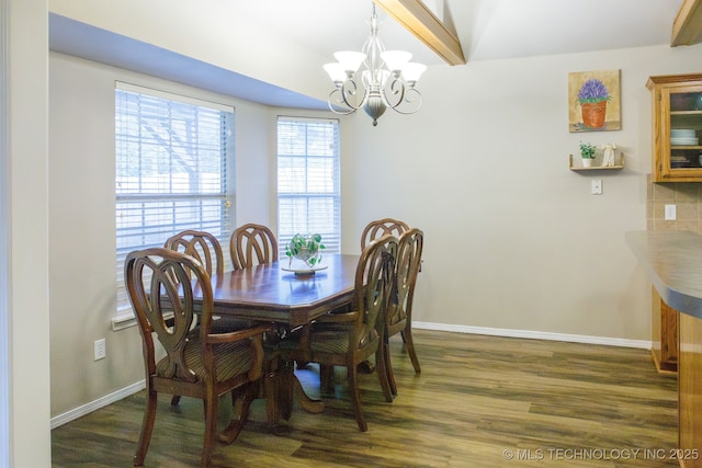 dining room featuring a notable chandelier, beam ceiling, and dark wood-type flooring