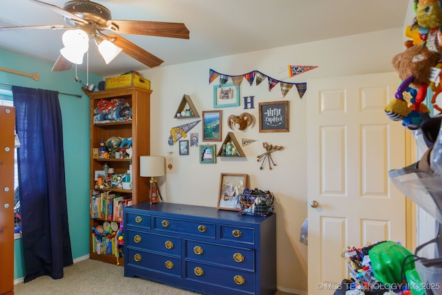 carpeted bedroom featuring ceiling fan