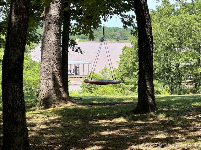 view of yard with a water view