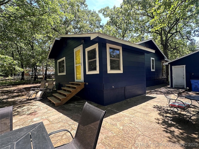 exterior space with a patio area