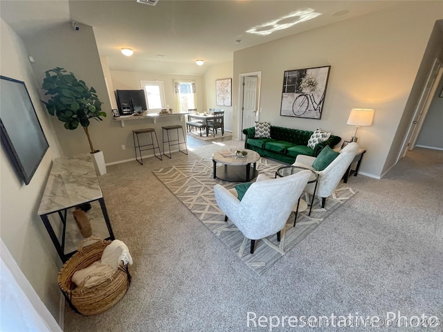 living room featuring light carpet