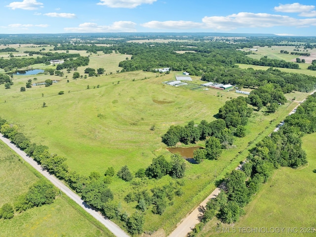 bird's eye view featuring a water view and a rural view