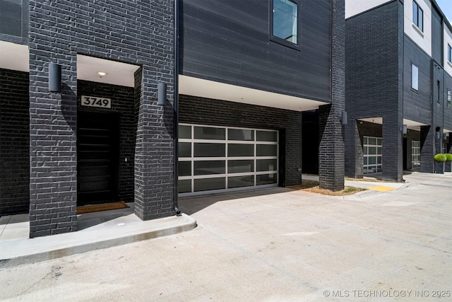 exterior space with a garage