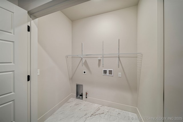 laundry area with hookup for a gas dryer, hookup for a washing machine, and electric dryer hookup